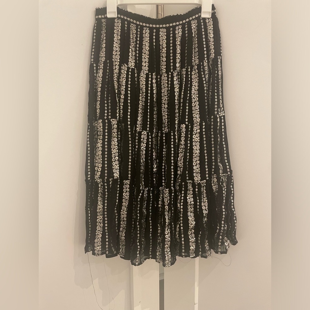 Black tiered midi skirt with silver metallic flowers
